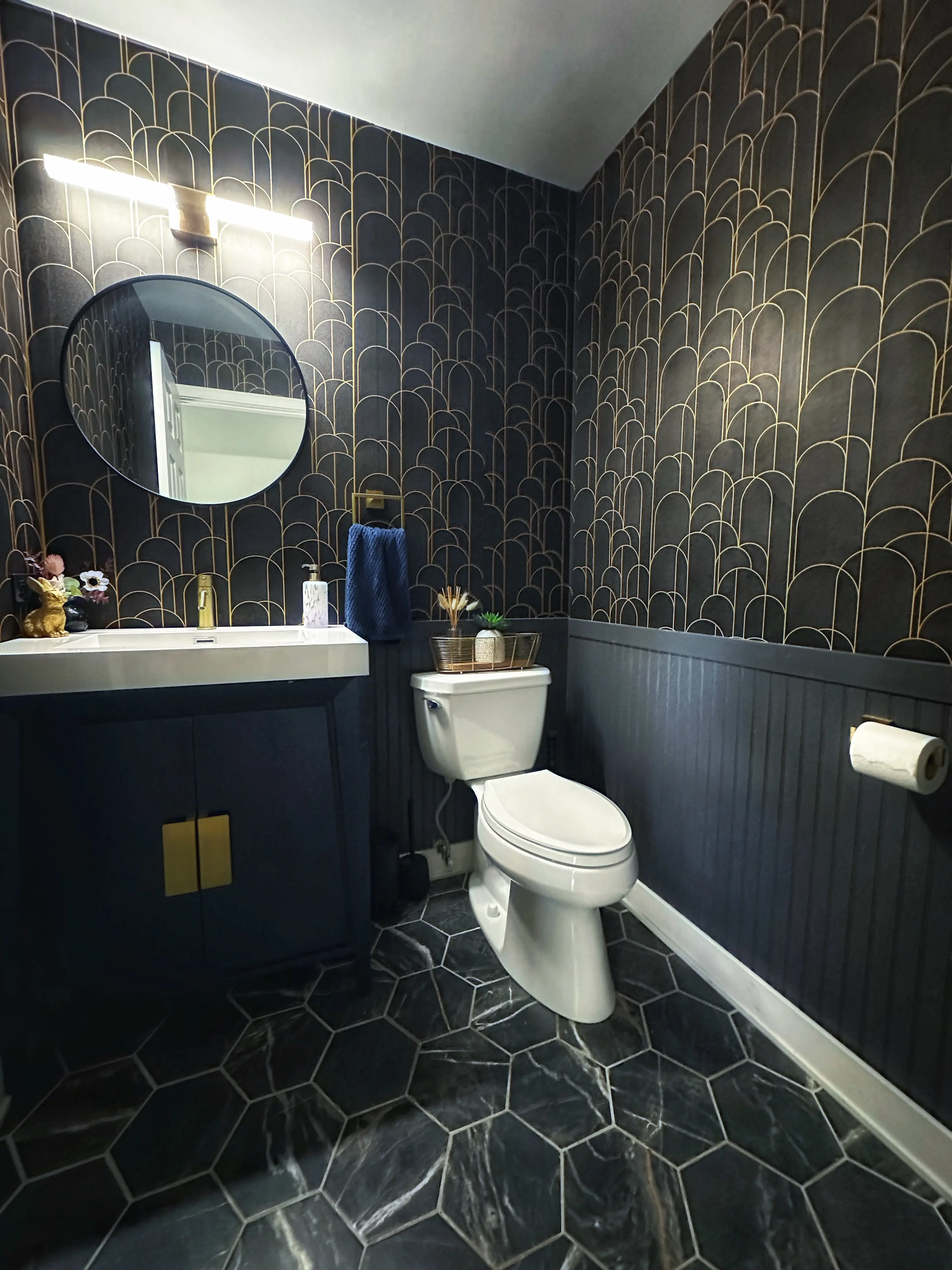 Elegant modern powder room design by KGM Construction